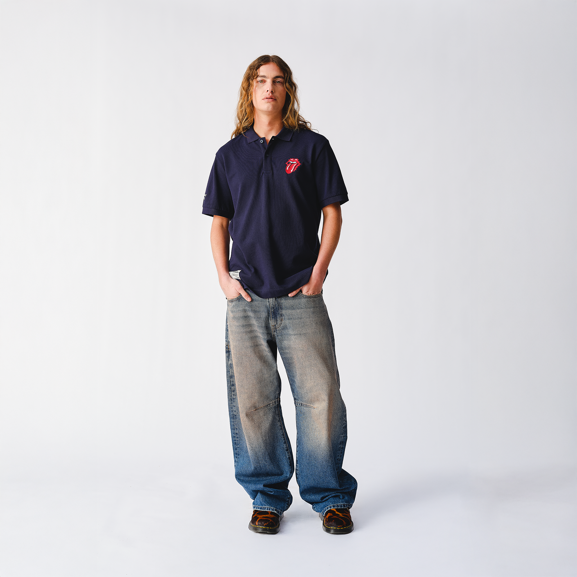 Scorching Stones Tongue Embroidered Navy Polo Shirt