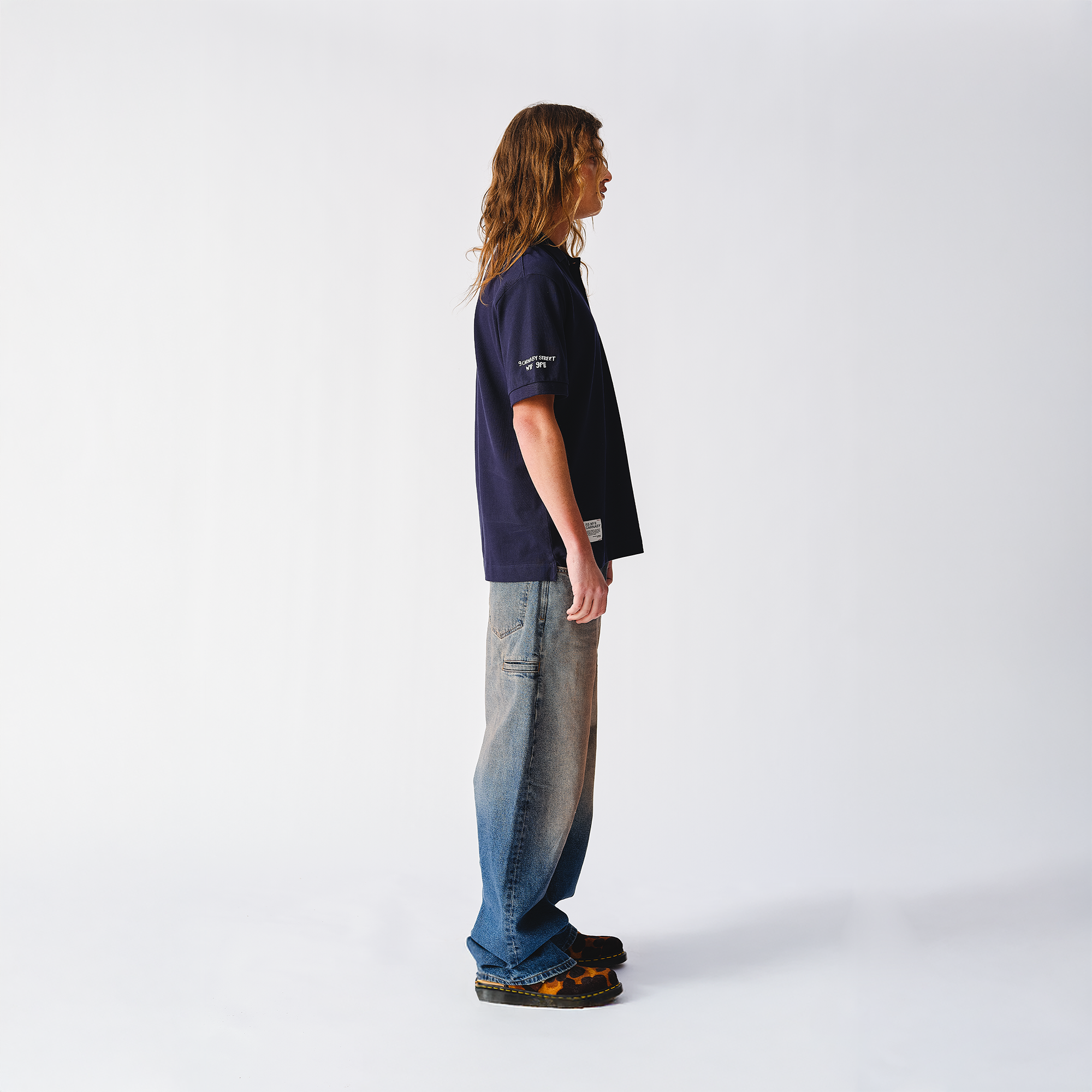 Scorching Stones Tongue Embroidered Navy Polo Shirt