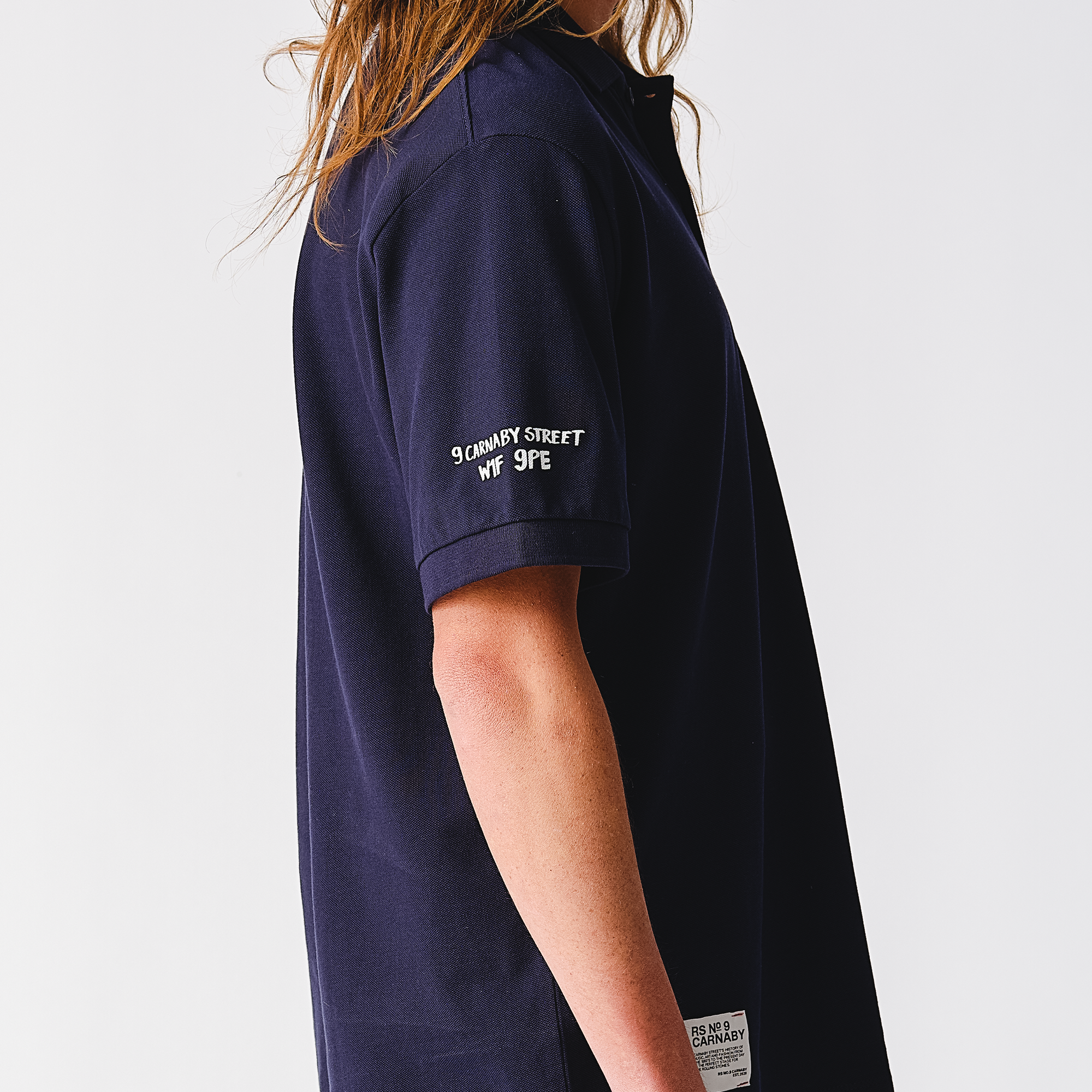Scorching Stones Tongue Embroidered Navy Polo Shirt