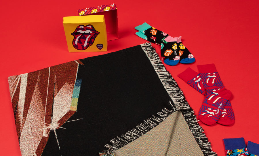Rolling stones socks and blanket on a red background