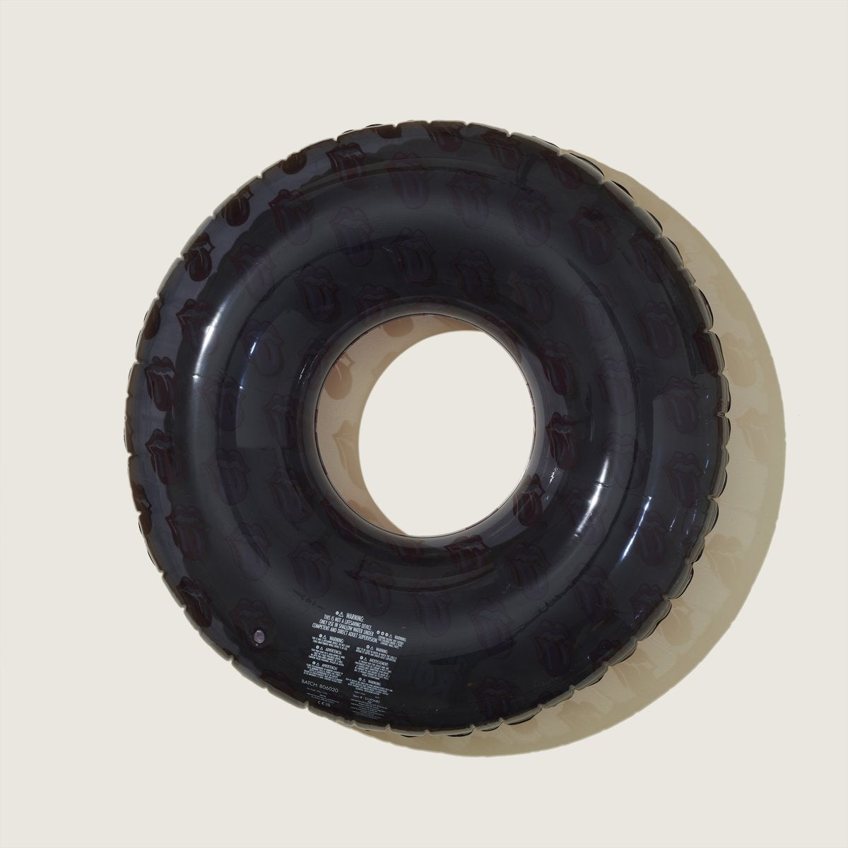 Stones x Sunnylife Tongue Print Black Pool Ring Float Back